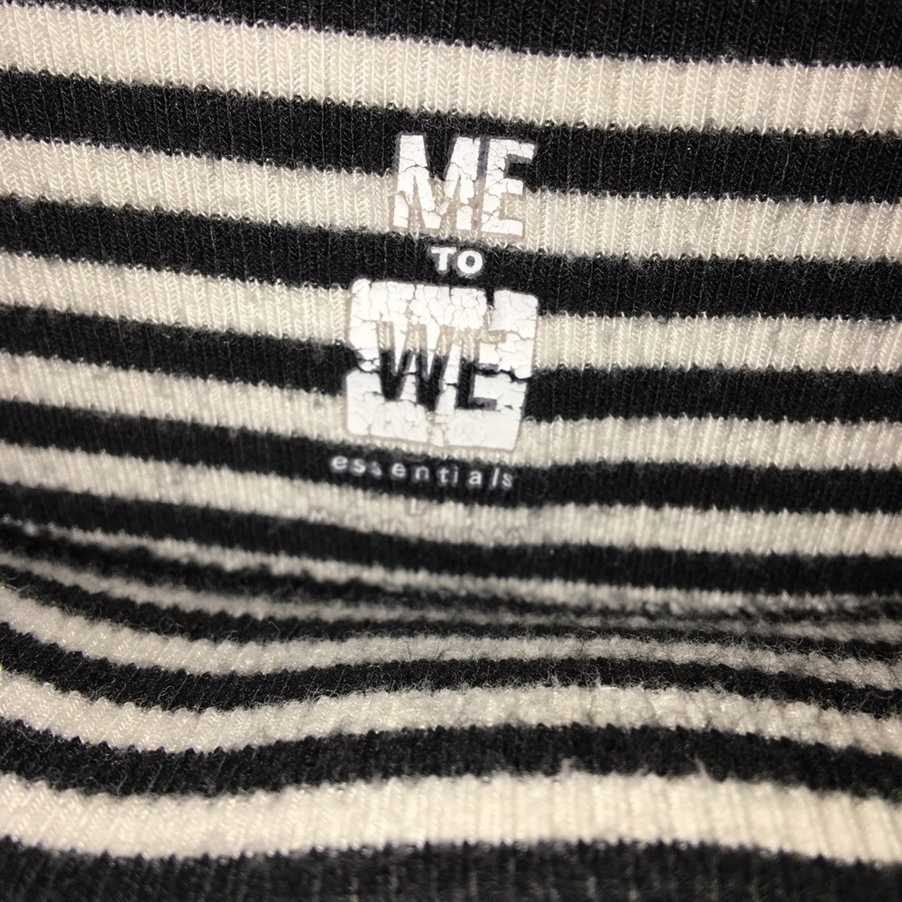 A black and white stripe off the shoulder shirt